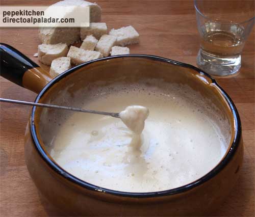 Fondue de queso y tomate